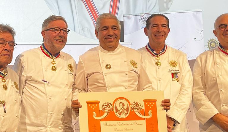 Intronisation d'Yves Moulin, enseignant en cuisine à l'Ecole des Métiers